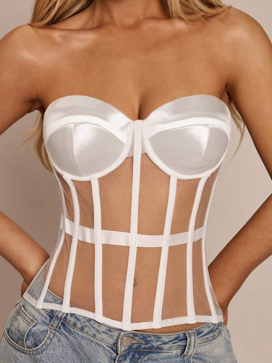 Women's black mesh patchwork bustier corset crop top with sweetheart neckline and asymmetrical hem.