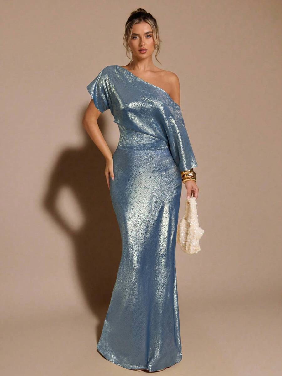Black low waist extra long mermaid maxi skirt with asymmetrical zipper detail and side slit.
