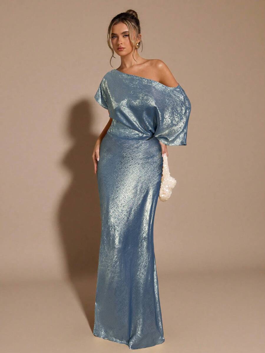 Black low waist extra long mermaid maxi skirt with asymmetrical zipper detail and side slit.