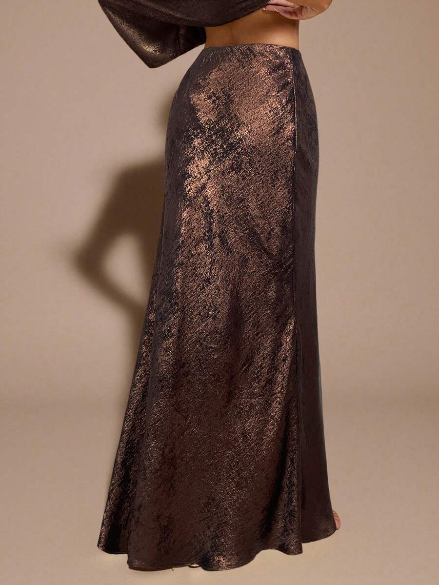 Black low waist extra long mermaid maxi skirt with asymmetrical zipper detail and side slit.