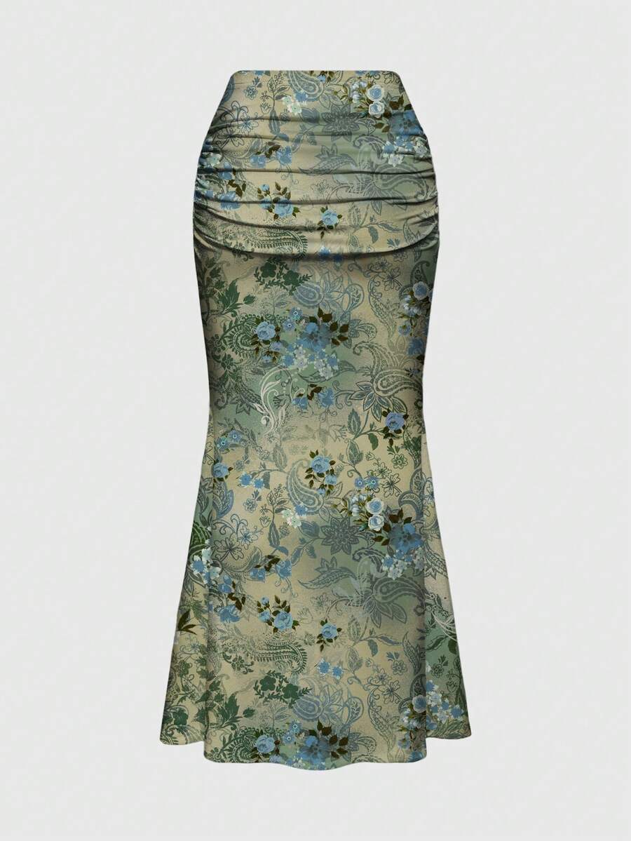 Black low waist ruched bodycon maxi skirt with sun and moon full print pattern on high stretch knitted fabric.