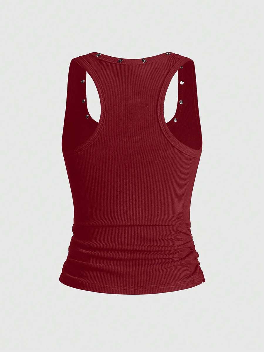 Black scoop neck tank top for women featuring a graphic star print design in a slim fit silhouette.