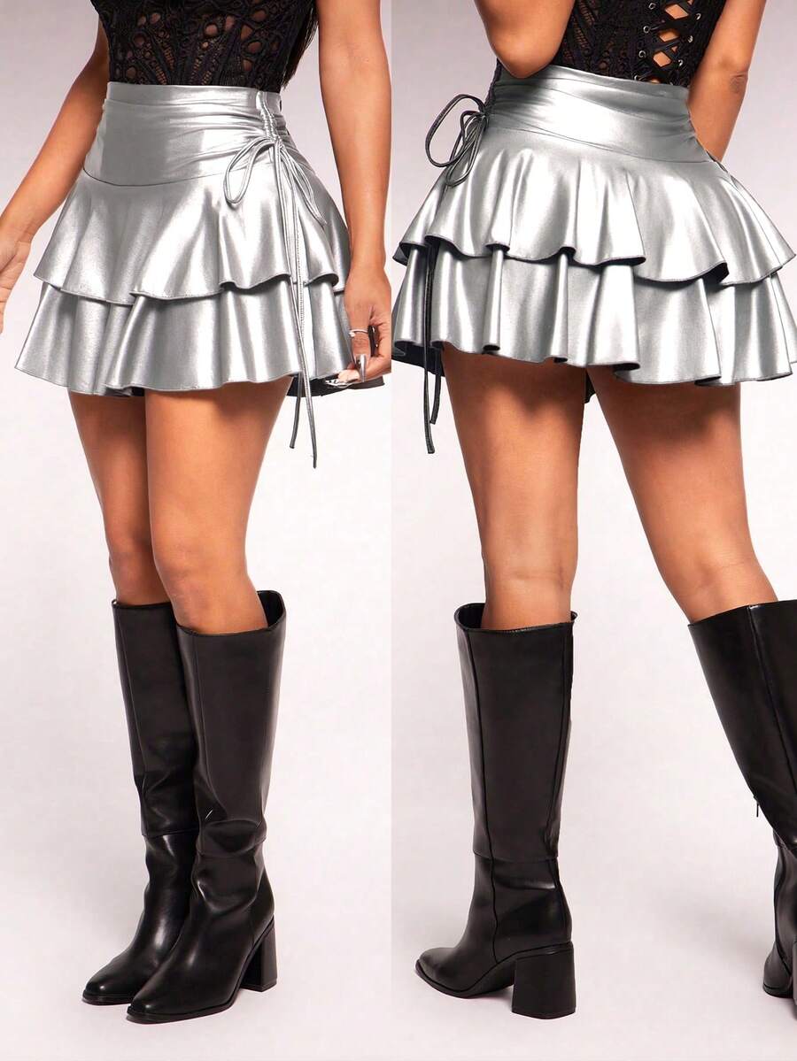 Women's black PU coated layered ruffle mini skirt featuring a high waist, tiered ruffle hem, and zipper detail.