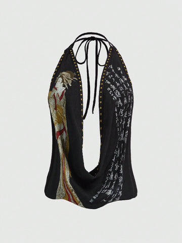 Women's black backless halter crop top featuring a V-neckline, tie-back detail, and asymmetrical hem.