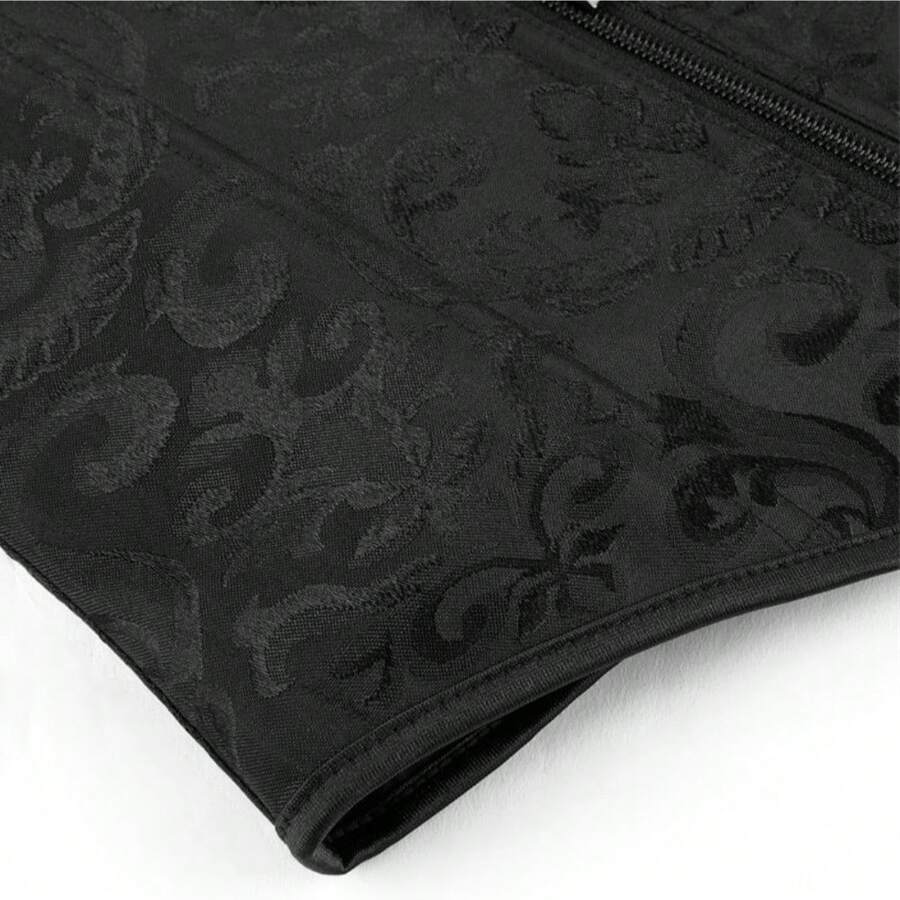 Vintage lace-up waist trainer corset with grommet eyelet details and plant pattern, designed for Halloween styling.