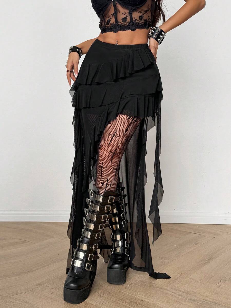 Women's black asymmetrical long skirt with ruffle hem and low waist design in knitted fabric.