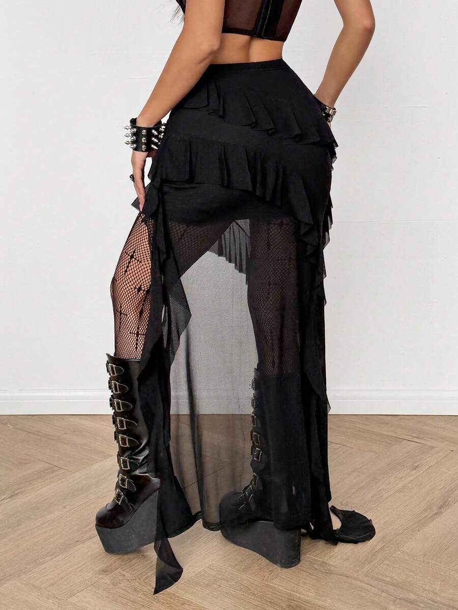 Women's black asymmetrical long skirt with ruffle hem and low waist design in knitted fabric.