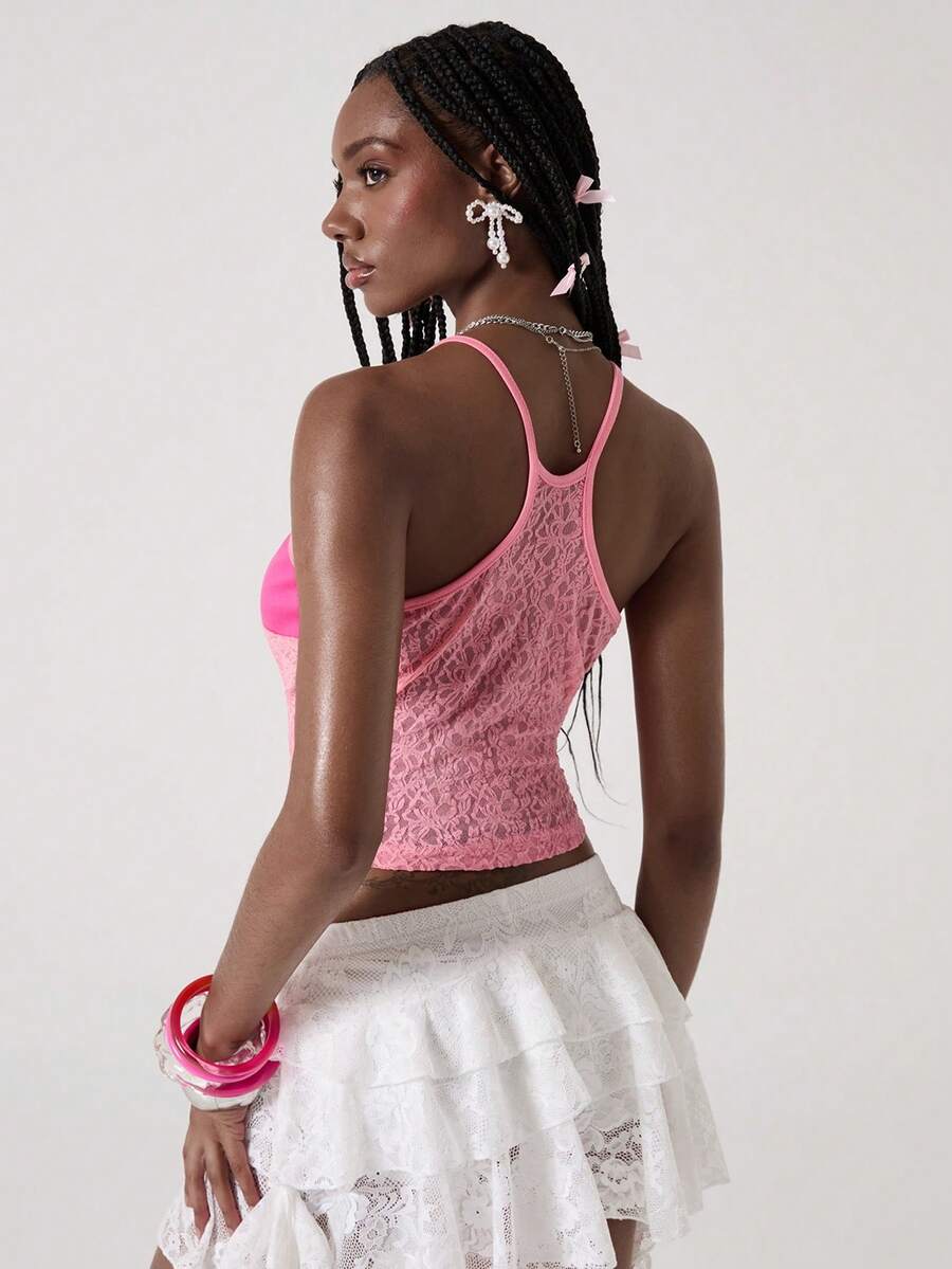Women's hot pink contrast lace graphic embroidered camisole top featuring spaghetti straps, slim fit micro crop length, and semi-sheer unlined knitted fabric.