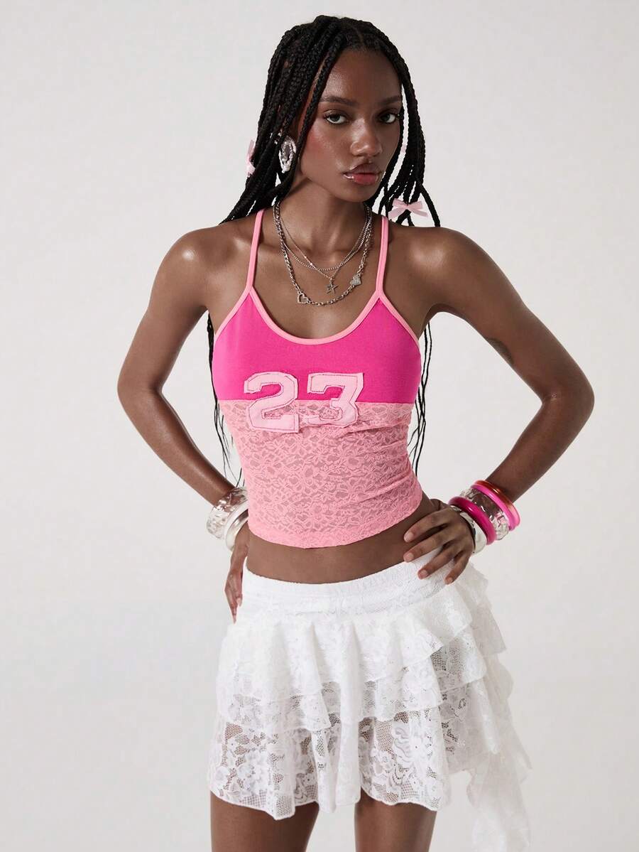 Women's hot pink contrast lace graphic embroidered camisole top featuring spaghetti straps, slim fit micro crop length, and semi-sheer unlined knitted fabric.