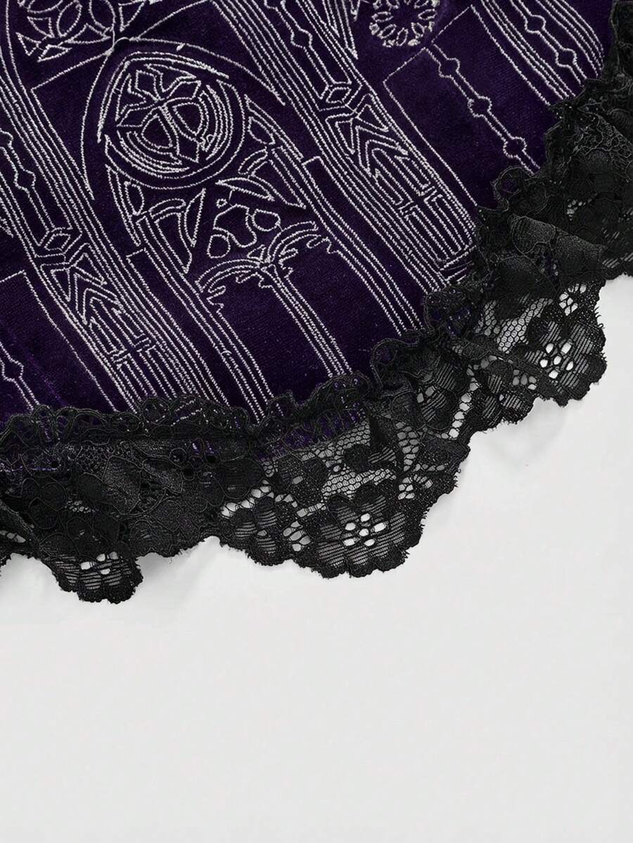 Black gothic velvet crop camisole for women featuring contrast lace trim, an asymmetrical hem, graphic print, and strap shoulder design.