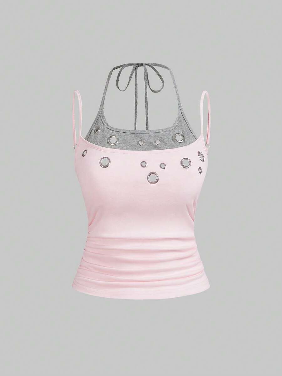 Black halter crop tank top for women featuring lace up front details, ruched accents, and appliques in a slim fit knitted fabric.
