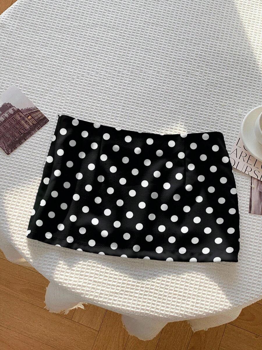 Women's white 100% cotton low waist mini skirt featuring a tropical print and zipper detail.
