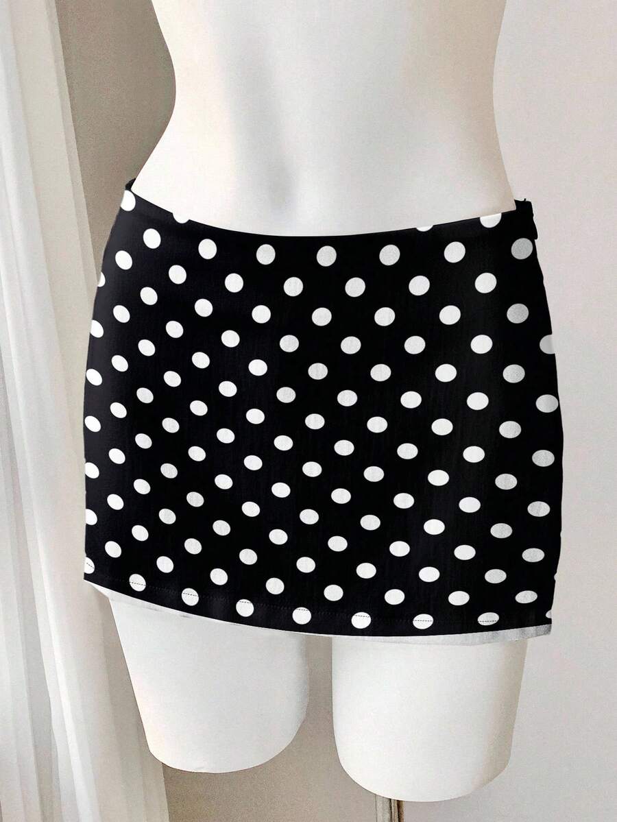 Women's white 100% cotton low waist mini skirt featuring a tropical print and zipper detail.