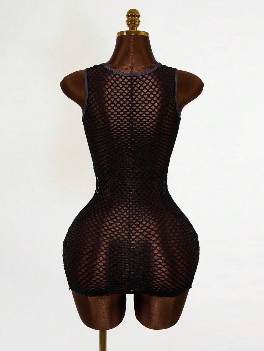 Women's black sheer mesh bodycon mini dress featuring slogan graphic print, round neckline, cut-out pointelle details, and a sleeveless slim fit pencil silhouette.