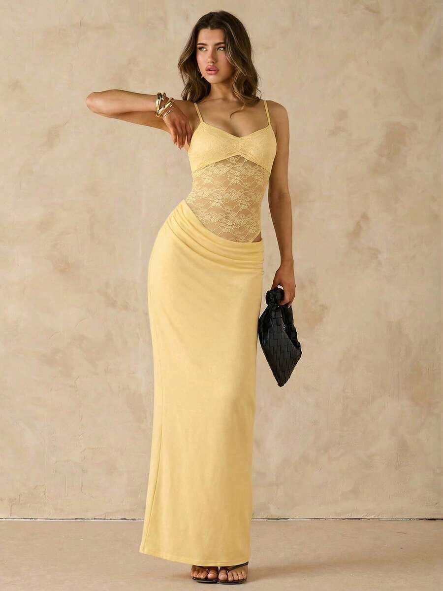Women's black backless lace patchwork maxi dress with spaghetti straps and mermaid hem.