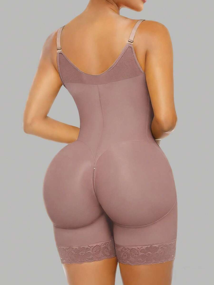Women's black full body shaper featuring tummy control, steel bone back support, crotch zipper, and open bust design.