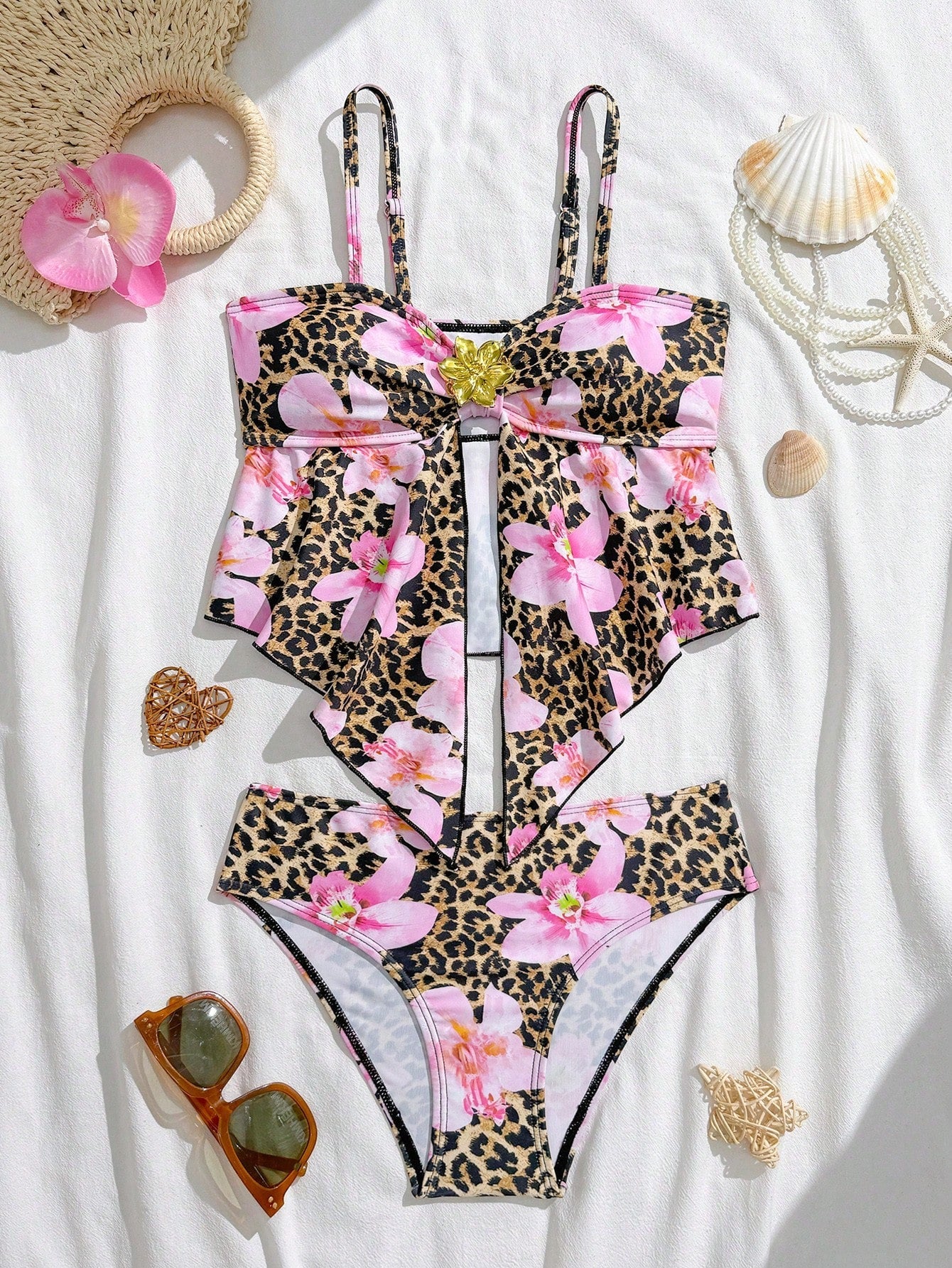 Tween girls two-piece tankini swimwear set with spaghetti straps, asymmetrical design, and 3D rose detail. Features a plant-pattern top and mid-waist bottoms in stretchy fabric for beach or pool wear.