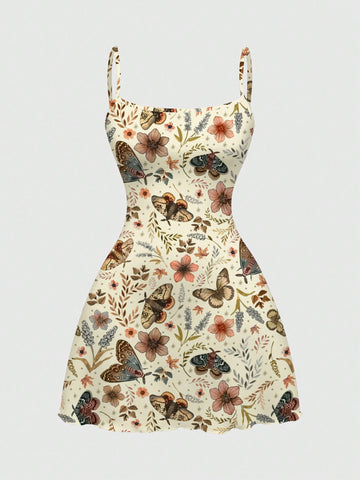 Beige graphic cami mini dress for women featuring a backless slim fit design, high waist flared hem, lettuce trim, spaghetti straps, and arm sleeves.