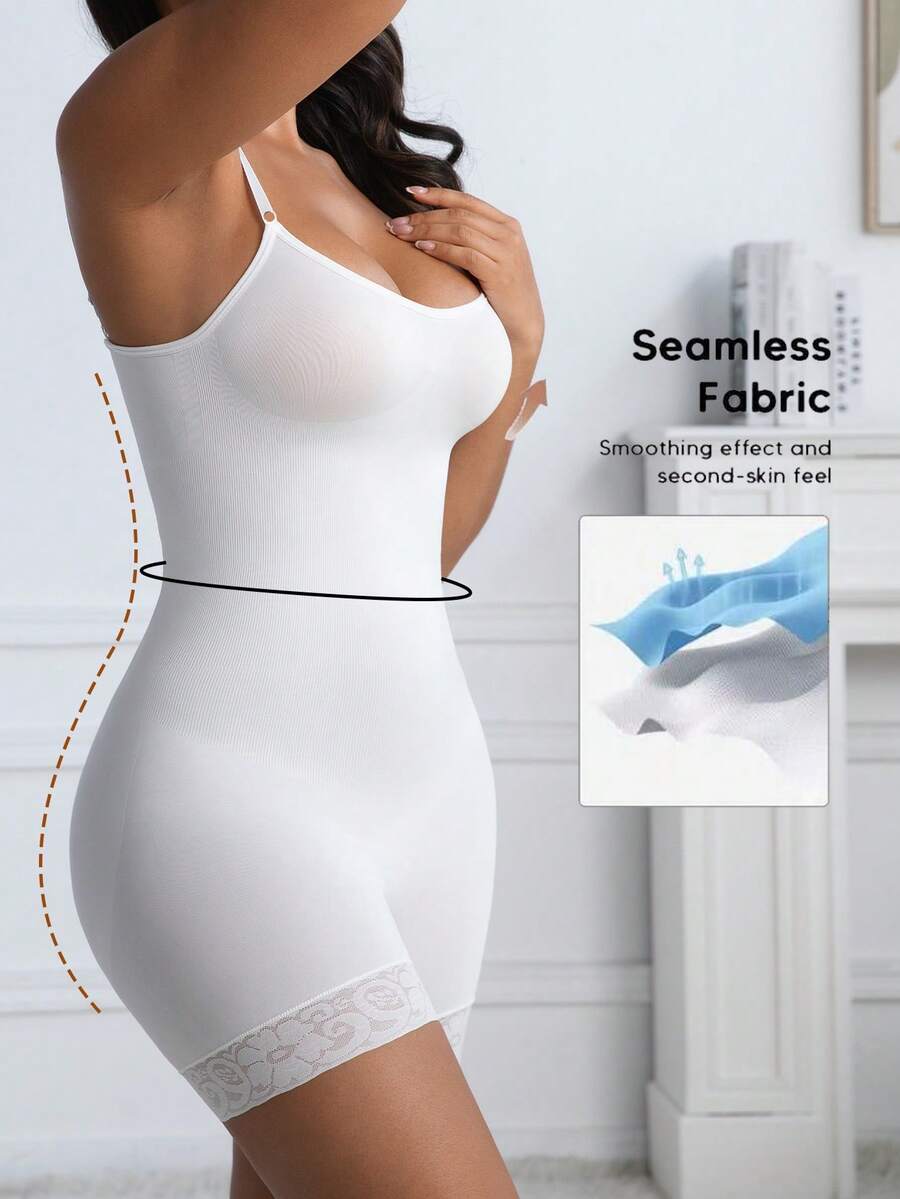 Women's black seamless lace shapewear jumpsuit with spaghetti straps featuring tummy control and full-length coverage.