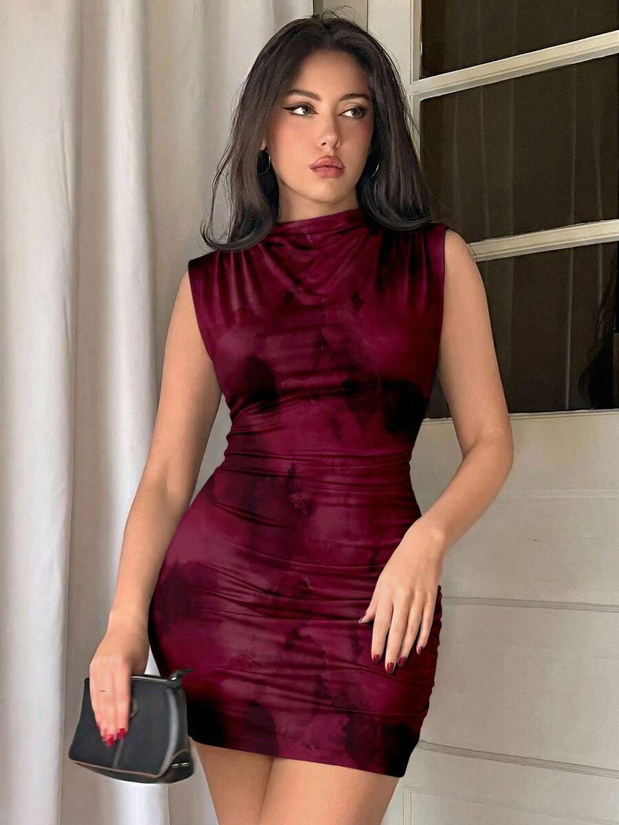 Army green sleeveless bodycon mini dress with a stand collar, ruched details, and zipper back.