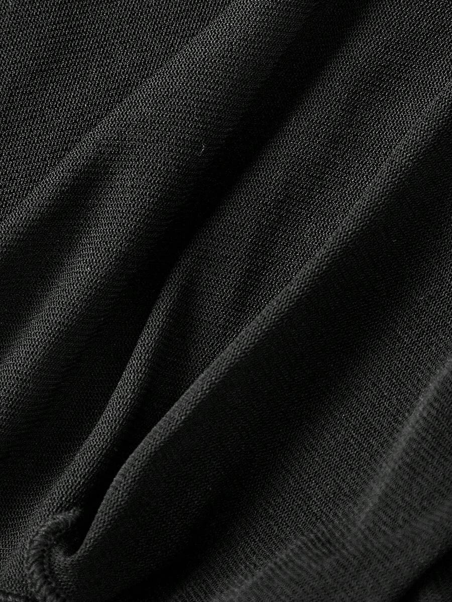 Women's black Y2K backless mesh mini dress featuring an asymmetrical neckline, tie-back knot detail, and a slim fit flared A-line silhouette.