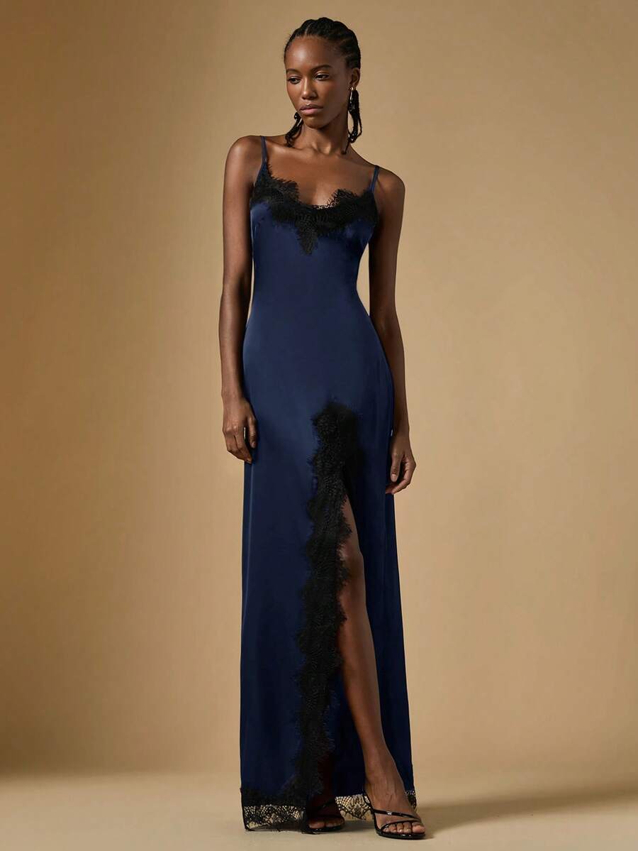 Women's black lace split satin long dress featuring spaghetti straps, asymmetrical slit hem, and matching arm sleeves.