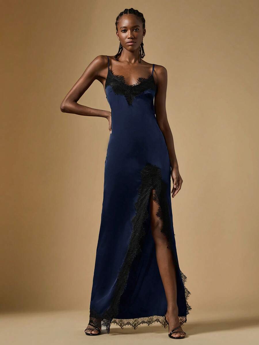 Women's black lace split satin long dress featuring spaghetti straps, asymmetrical slit hem, and matching arm sleeves.