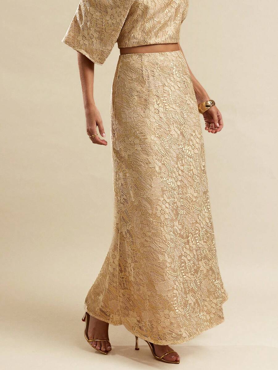 Black low waist extra long mermaid maxi skirt with asymmetrical zipper detail and side slit.
