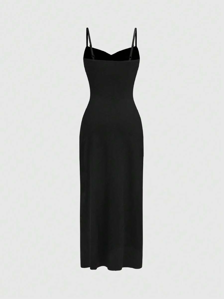 Black gothic bodycon slip dress featuring spaghetti straps, lace-up grommet eyelet accents, and a high split thigh hem.
