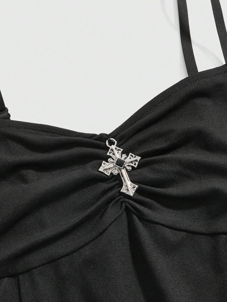 Black gothic bodycon slip dress featuring spaghetti straps, lace-up grommet eyelet accents, and a high split thigh hem.