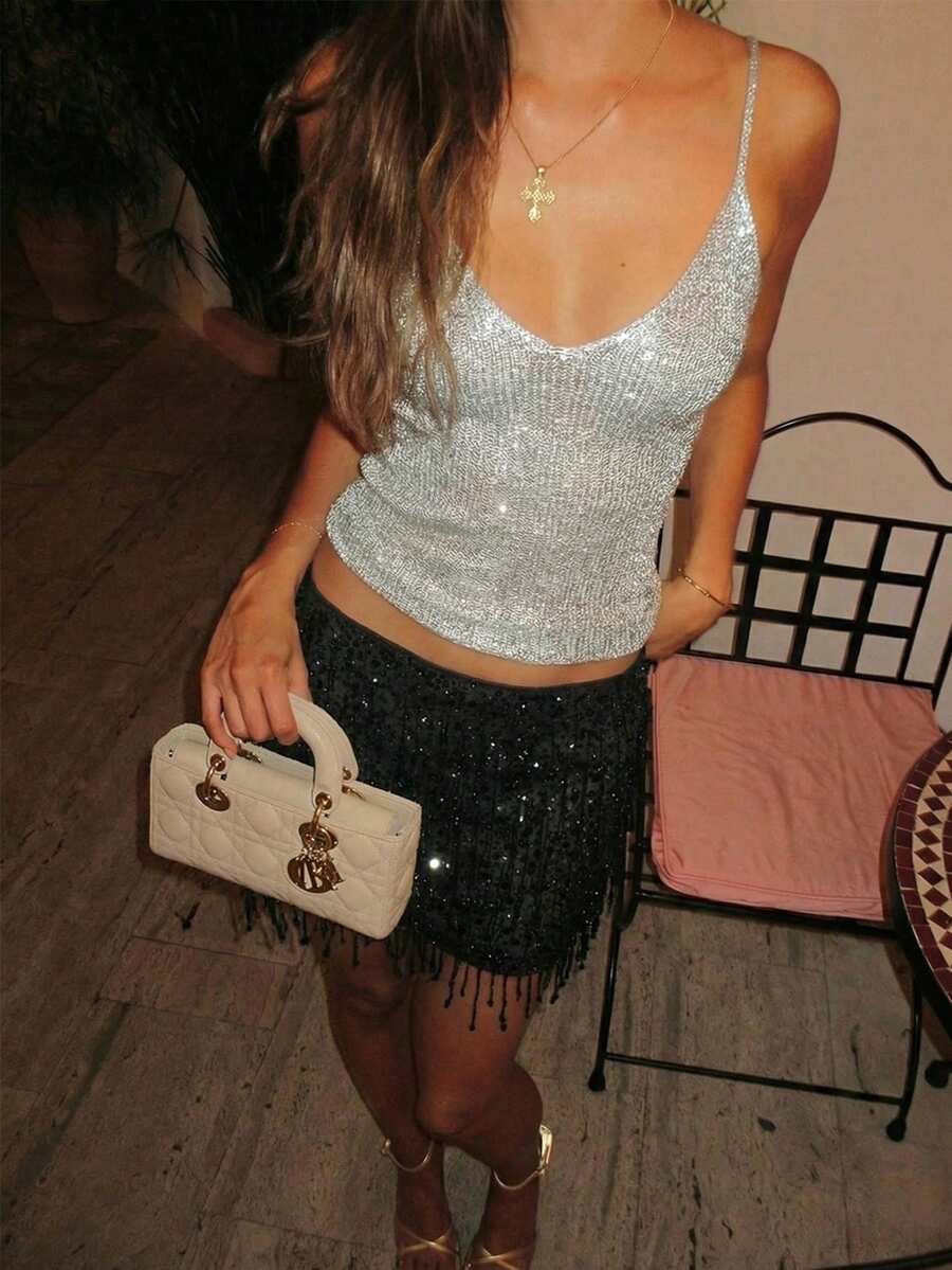 Grey rib-knit camisole top featuring a V-neckline and thin spaghetti straps for women.