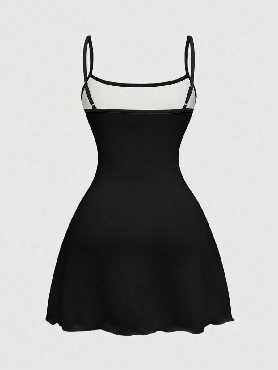 Women's black backless cami mini dress featuring spaghetti straps, lettuce trim, and a flared hem in high stretch knitted fabric.