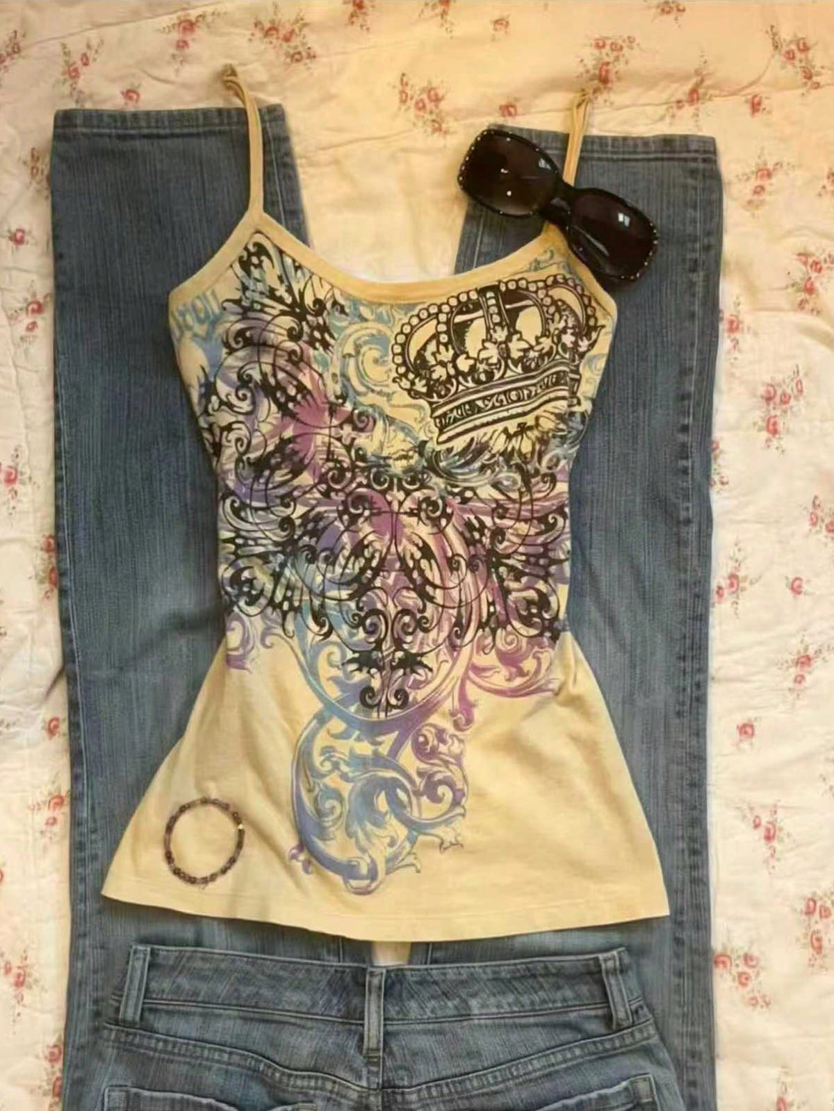 Burgundy cross pattern camisole top featuring spaghetti straps, ring accent, and a backless slim fit design.