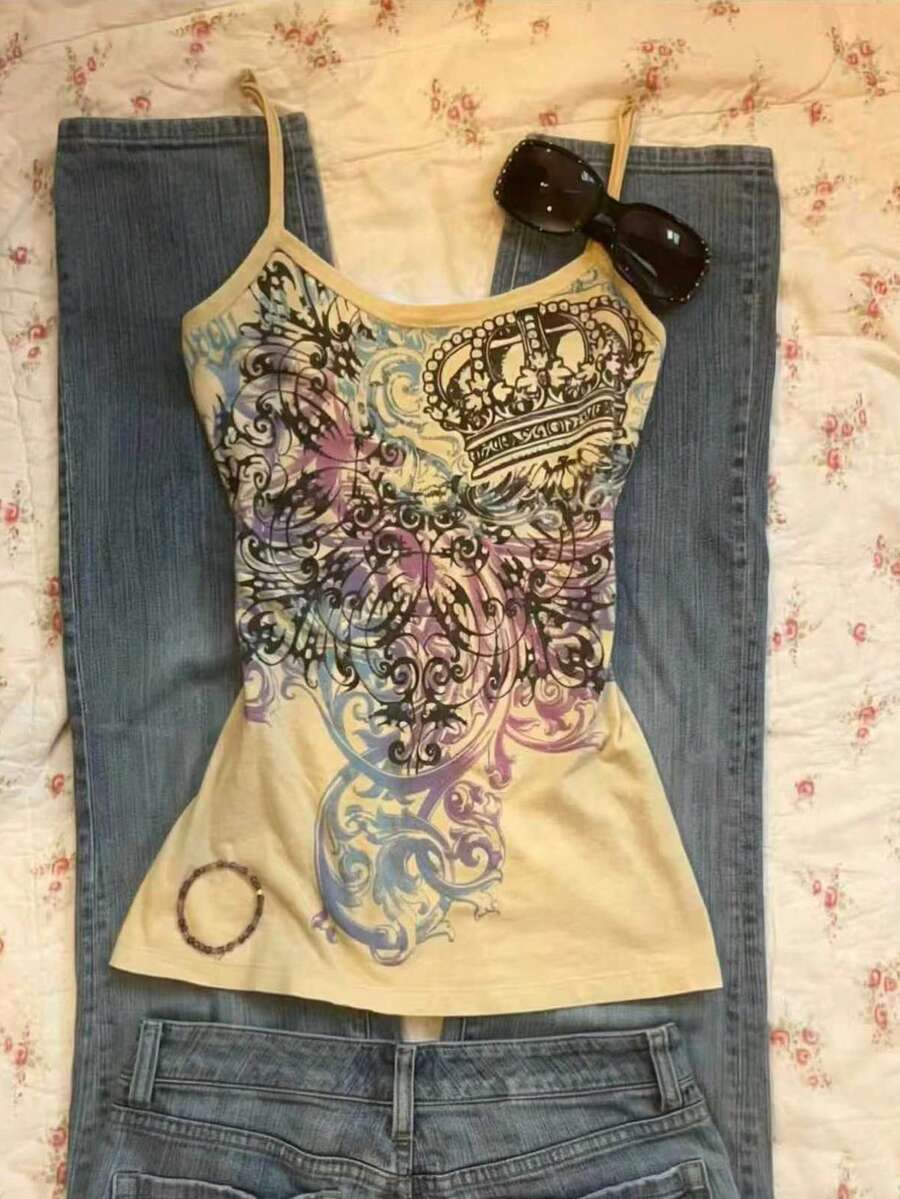 Burgundy cross pattern camisole top featuring spaghetti straps, ring accent, and a backless slim fit design.