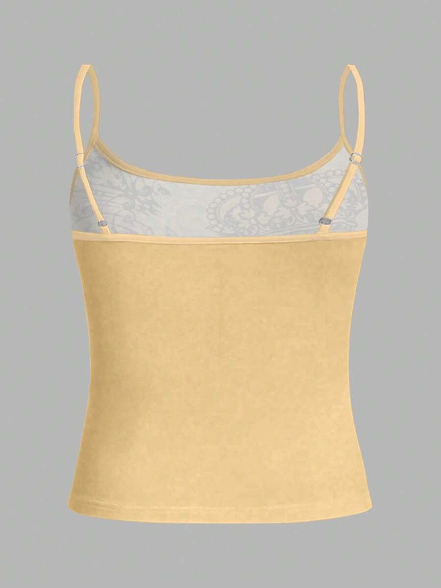 Burgundy cross pattern camisole top featuring spaghetti straps, ring accent, and a backless slim fit design.