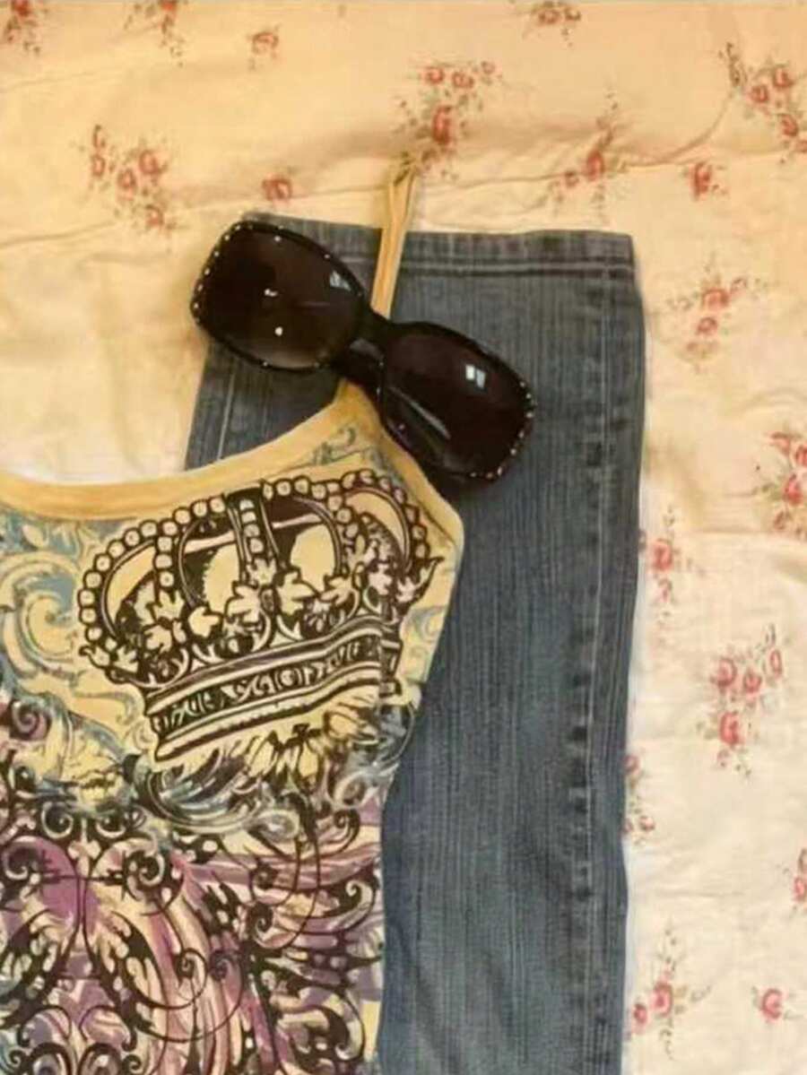 Burgundy cross pattern camisole top featuring spaghetti straps, ring accent, and a backless slim fit design.