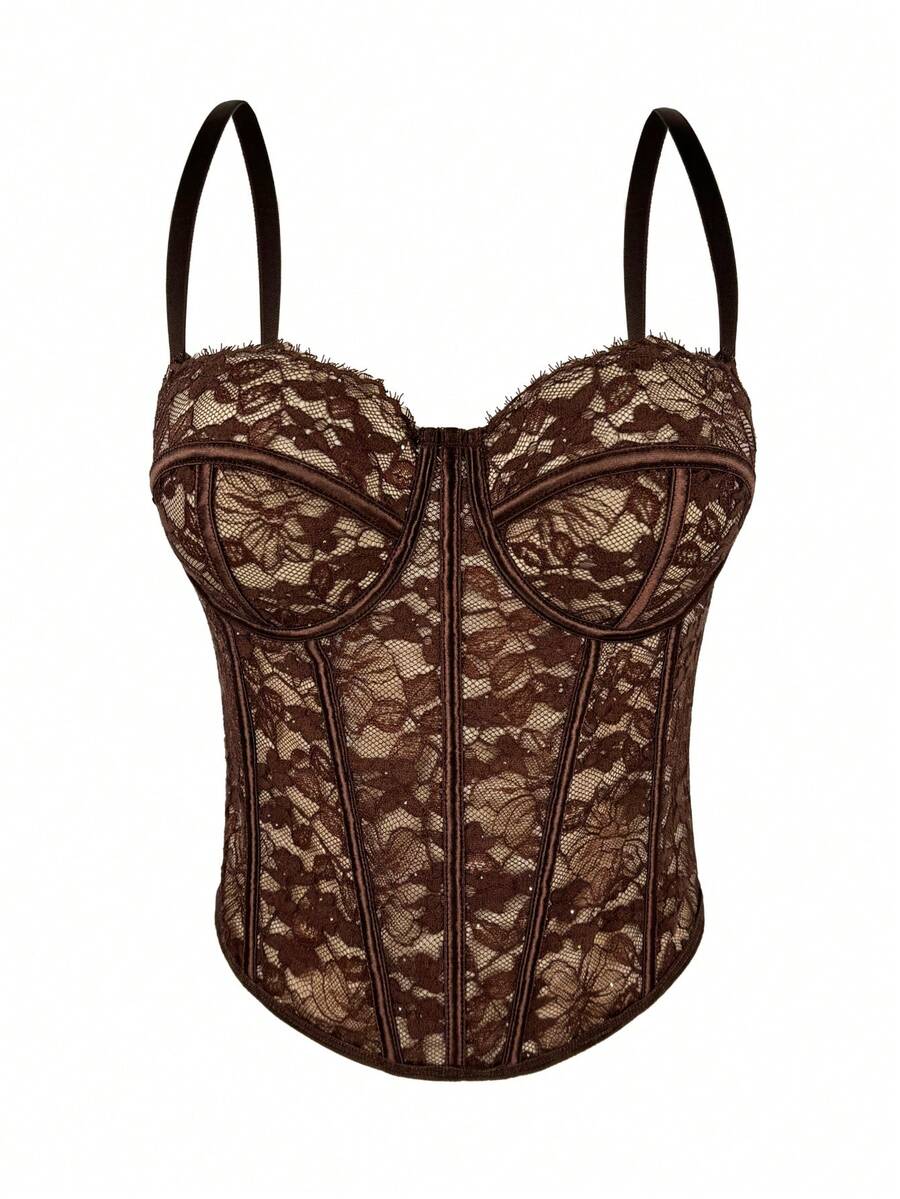 Black women's shaping cami with contrast lace, spaghetti straps, asymmetrical hem, lined body, and slim fit for casual and night-out styling.