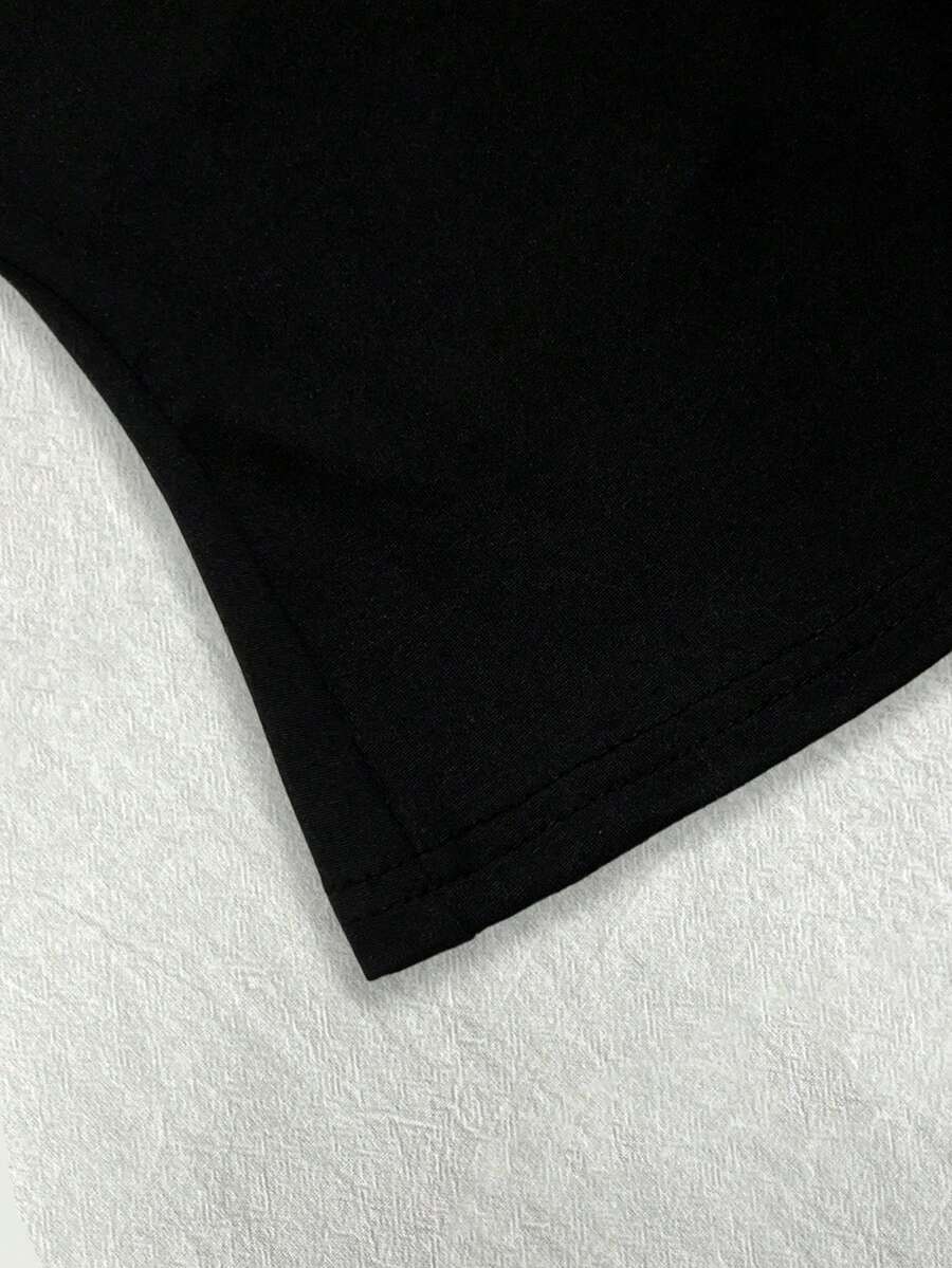 A women's solid slim fit camisole top with delicate contrast lace trim around the neckline and spaghetti straps.