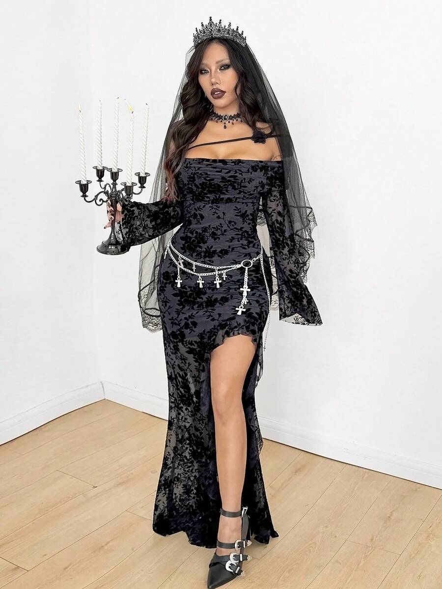 Women's black floral goth maxi dress with an asymmetrical neckline, long sleeves, semi-sheer knitted fabric, and a high split thigh hem in a slim fit bodycon style.