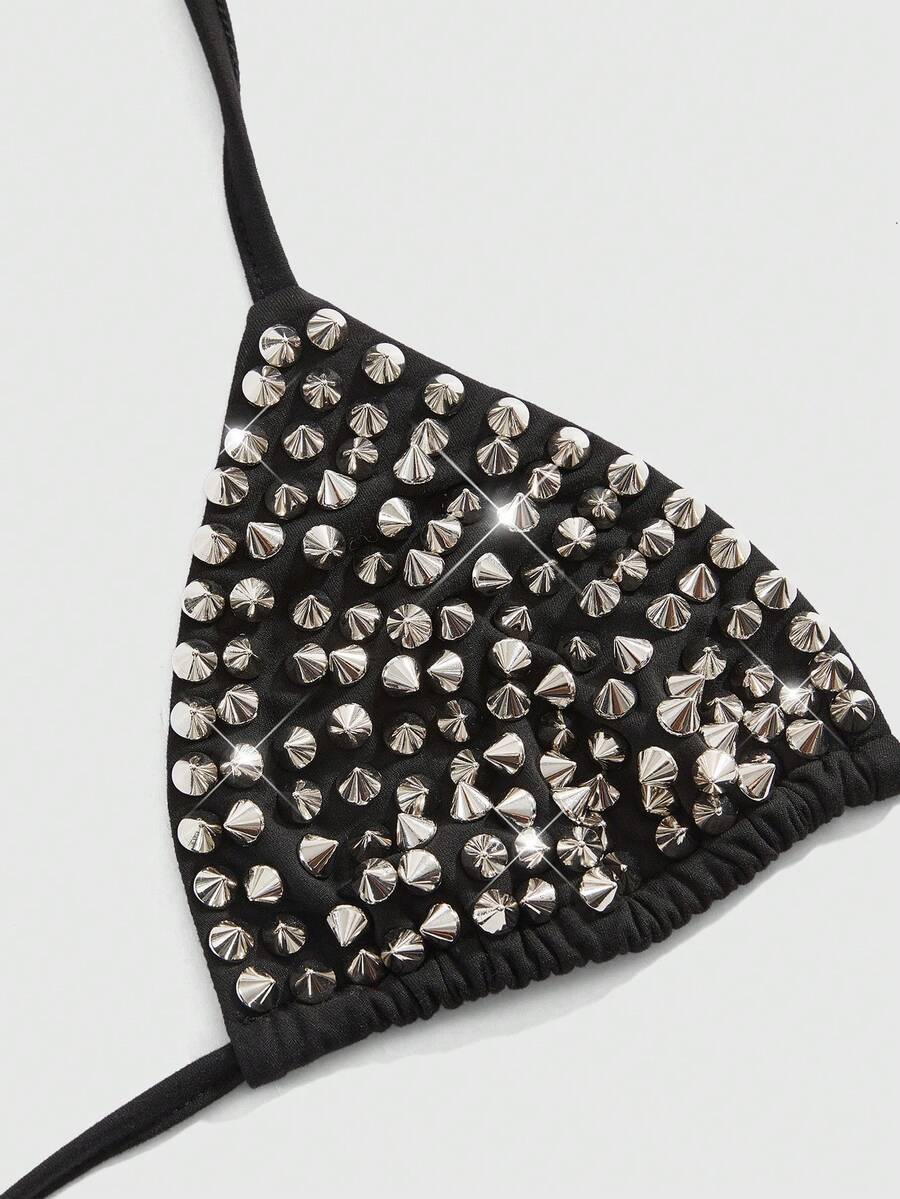 Black studded halter bikini top featuring a backless lace-up design, rhinestone accents, and high-stretch knitted fabric.