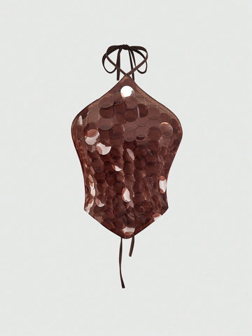 Brown sequin halter crop top with asymmetrical knot hem and backless design for women.