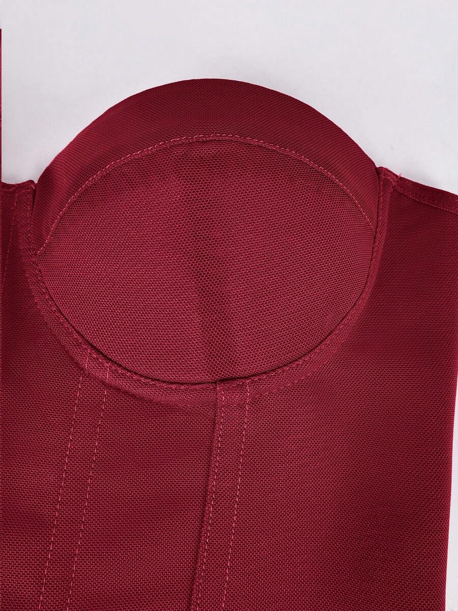 Red strapless corset top with boning and lace-up back, slim fit cropped tube top for women.