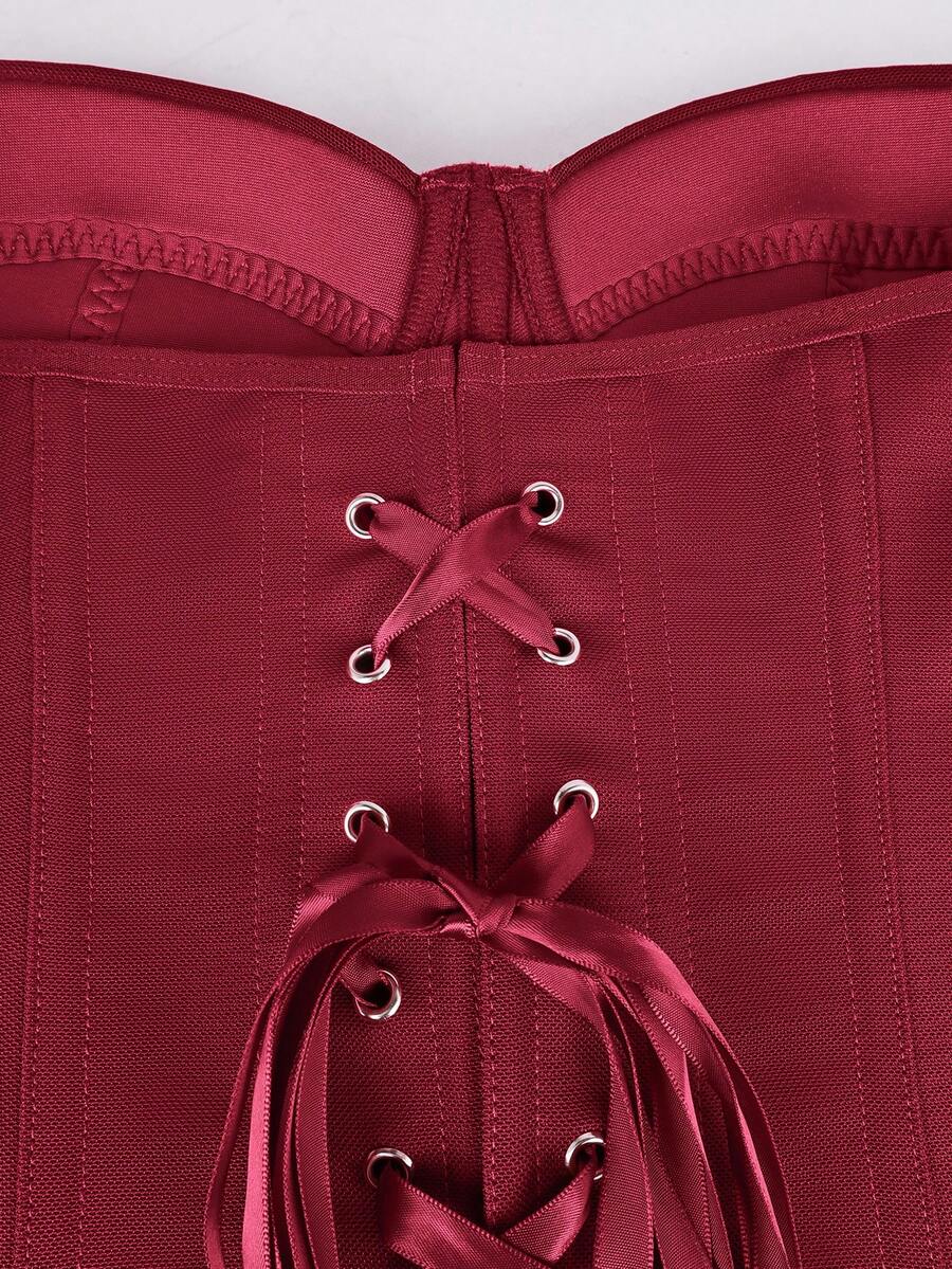 Red strapless corset top with boning and lace-up back, slim fit cropped tube top for women.
