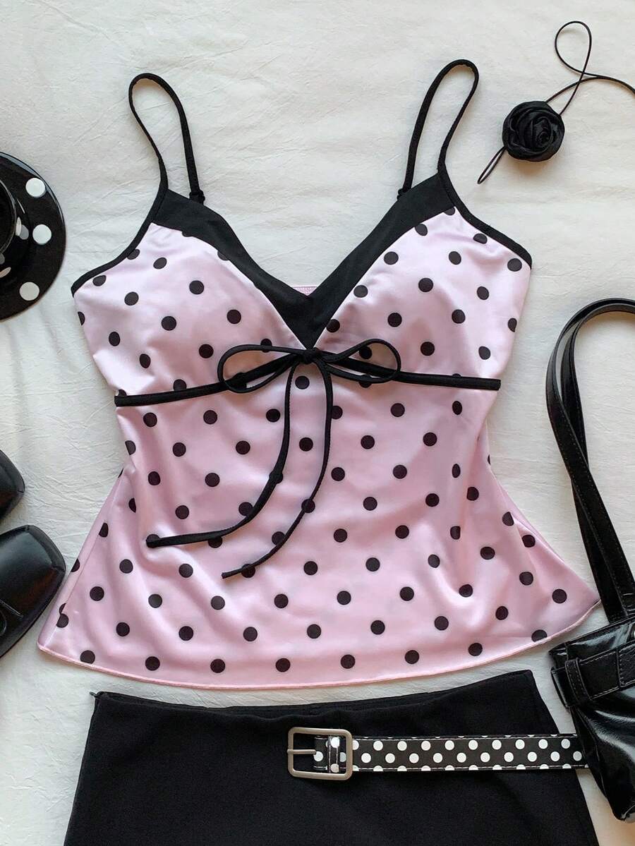 Black and white polka dot tie strap camisole top for women with thin spaghetti straps and slim fit.