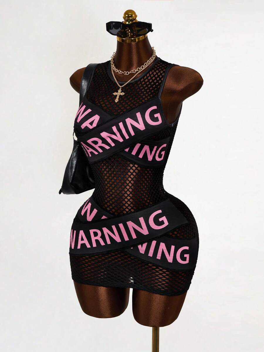 Women's black sheer mesh bodycon mini dress featuring slogan graphic print, round neckline, cut-out pointelle details, and a sleeveless slim fit pencil silhouette.