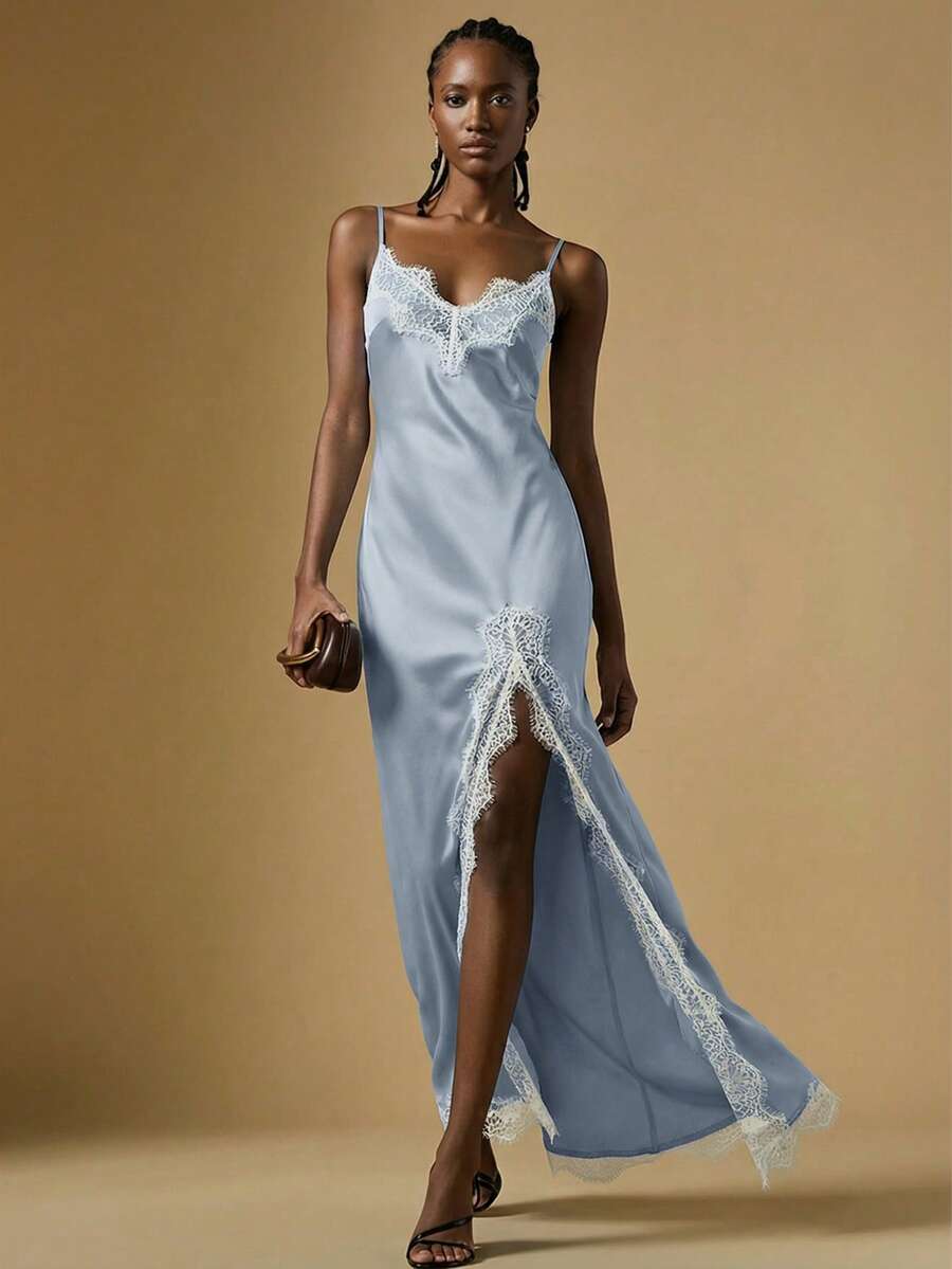 Women's black lace split satin long dress featuring spaghetti straps, asymmetrical slit hem, and matching arm sleeves.