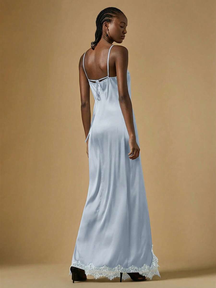 Women's black lace split satin long dress featuring spaghetti straps, asymmetrical slit hem, and matching arm sleeves.