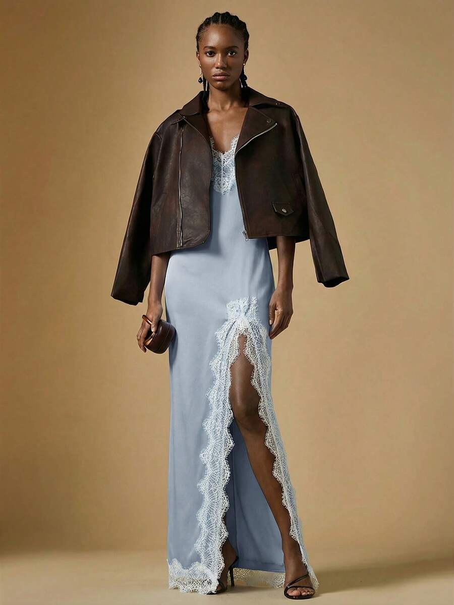 Women's black lace split satin long dress featuring spaghetti straps, asymmetrical slit hem, and matching arm sleeves.