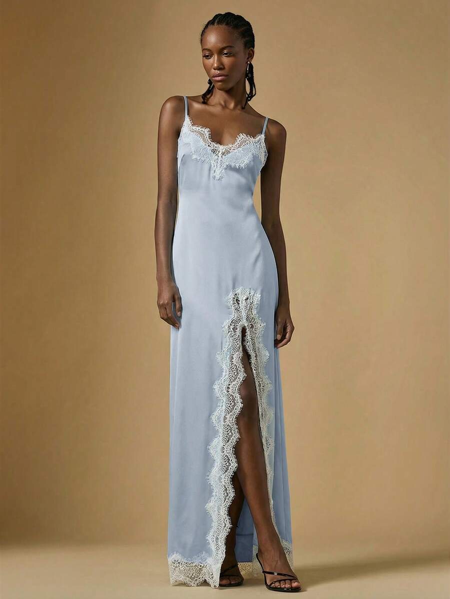 Women's black lace split satin long dress featuring spaghetti straps, asymmetrical slit hem, and matching arm sleeves.