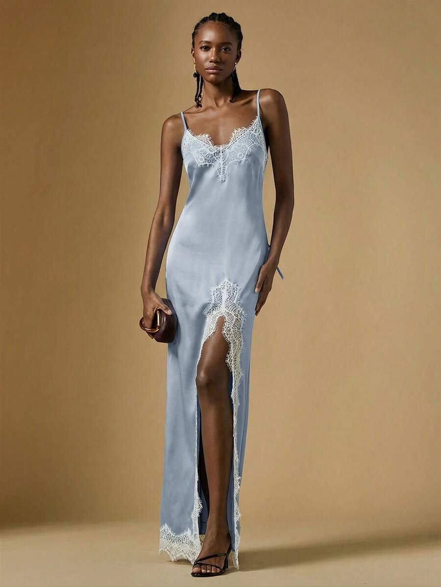 Women's black lace split satin long dress featuring spaghetti straps, asymmetrical slit hem, and matching arm sleeves.